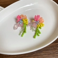 Detail of colorful beaded flower earrings with pink petals and green leaves on a white tray - 14# Silver Earring Post - Colorful - Flower