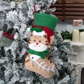 Christmas stocking with a cute 3D cartoon cat design on a festive indoor Xmas tree scene - Christmas Cat Stocking