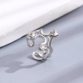 Adjustable silver bow ring with wave design and three sparkling cubic zirconia stones - Silver Fluid Triple Diamond Ring (X202)