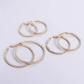 Drie paar gouden titanium stalen oorringen in verschillende maten met kristallen inlay - 40mm