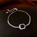 Double-layered silver bracelet with purple zircon gourd charm and adjustable slider clasp - Silver Purple Stone Bolo Bracelet