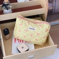 Quilted yellow plaid makeup bag with pink bows and woven label in wooden drawer - Clutch Bag / Yellow
