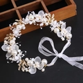 Detail of bridal floral headband with white pearls and gold leaves on black background - Pearl Flower Headband - White