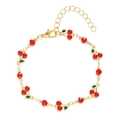 Adjustable golden bracelet featuring red cherry charms and green leaves on white background - 001 Cherry / Bracelet