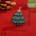 Macro view of Christmas tree resin pendant showing dimensions 2.8cm by 2.3cm - Green Christmas Tree with Gold Star