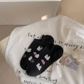 Black low-cut boat socks featuring a white bunny pattern and LOVE text embroidery - One Size / Black