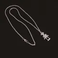 Polished silver robot pendant necklace with a fine cross chain on a black background - Silver Copper Chain (Robot Shape)