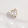 Macro detail of silver heart charm with sparkling heart-shaped zircon for DIY jewelry - Silver Heart Bead