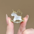 Unicorn rocking horse brooch in gold with iridescent white shell and clear zircons - 830# Heart Wings Unicorn