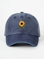Close-up of sunflower and butterfly embroidery on washed blue denim baseball cap - One Size / Navy Blue