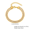 Dettaglio macro del bracciale a tre strati in perline d'oro e argento con chiusura a moschettone - Stile a Tre Strati di Perline Oro Argento (BR-2402GS)