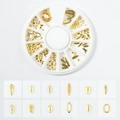 Golden alloy nail art set with moon star rivets in a 12-slot storage container - Marquise Series (XY-10)