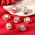 DIY beads featuring hand-painted red and white lucky cat charms for jewelry making - Dragon Head Luck / Blue