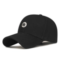 Black cotton baseball cap featuring a white circular embroidered logo and structured crown - Adjustable / Black