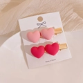 Set of two heart-shaped matte hair clips in soft pink and magenta with golden base - Pink Series Double Heart (Pair)
