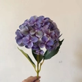 Realistic 3D printed purple hydrangea artificial flower stem held in hand - Deep purple