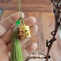 Matte gold hollow aroma diffuser pendant with green bead and long silk tassel - Single Green Tassel Accessory