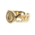 Macro detail of gold-plated letter O ring with heart and chain link hollow design - Letter O
