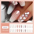 Coffin shaped press-on nails with white polka dots, pink floral patterns and butterflies - Jelly Glue Type / DZ639-B7 Floating Butterfly