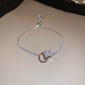 Silberner Armreif mit Zirkonia-Kreisen und verstellbarem Kordelzug-Schiebeverschluss - 18K Vergoldetes Zirkonia-Armband mit Kordelzug / Silber