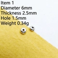 Dettaglio macro di perline distanziatrici in argento tibetano 6mm per gioielli fai da te - Stile 1