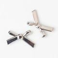 Close-up of two silver bow-shaped metal alloy beads for DIY jewelry making and crafts - Silver