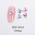Macro shot of 6x8mm heart-shaped AB rhinestone nail charms with silver metal edging - Silver Heart Style With AB Crystal (8919)