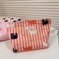 Detailed close-up of retro cat print cotton makeup bag with a sturdy metal zipper - Red Stripe Cat