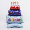 Giant three-tier birthday cake foil balloon with colorful patterns and candles - Standing Striped Cake
