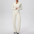 Detail of three-piece yoga set featuring zip jacket with thumbholes and wide-leg pants - S / Light Ivory