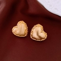 Detail of golden heart earrings with matte brushed finish and woven texture borders - Gold Brushed Woven Heart (25#)