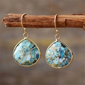 Close-up of bohemian teardrop earrings with turquoise stones and gold foil accents - Large Teardrop Wrapped + Gold Hook