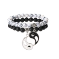 Detail of Yin Yang couples bracelet set featuring black lava and white marble beads - White Howlite + Lava Stone Set