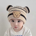 Baby knitted striped beanie with bear ears and patch on an infant model beige color - Reference Age: 3--36 Months/40-50cm / Creamy White - Striped Bear