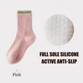 Pink mid-calf yoga socks with green trim and full-sole non-slip silicone grips - One Size / Pink