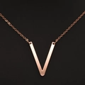 Elegant rose gold chain necklace featuring a polished V-shaped pendant in minimalist style - Rose Gold V