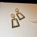 Detail of vintage gold square earrings with black checkered fabric and pearls on beige paper - Black Pearl Woven Geometric