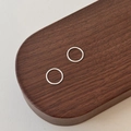 Minimalist S999 sterling silver hoop earrings in silver finish on a wooden tray - 990 Silver / Silver/10mm