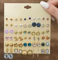 36 pairs of diverse mixed stud earrings featuring pearls, crystals and flower designs - Urban Lady Pearl Series (FX805)