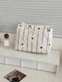 Quilted blue star and heart pattern makeup bag with a top zipper closure and cotton texture - Clutch Bag / Blue