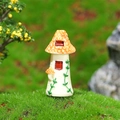 Miniature mushroom house resin figurine with orange roof and green vine details - Yellow Tile House
