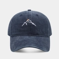Navy washed cotton baseball cap featuring white snow mountain and orange sunset embroidery - Adjustable / Navy Blue