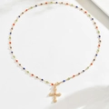 Layered gold necklace featuring colorful gemstones and a detailed cross pendant charm - Gold Cross Color Stone