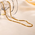 Golden stainless steel starburst chain necklace with a polished S.Steel tag on silk - Gypsophila Fine Chain NC1059G / 40+5cm