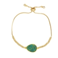 Adjustable golden bolo bracelet with a teardrop pendant featuring emerald green glitter - Green