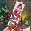 Detailed view of Christmas hair clip set with velvet bows and glitter stars on card - 8# Snowflake Hat 10-Piece Set
