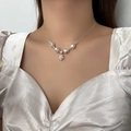 Elegant silver pearl necklace with star pendant and colorful gemstones on a model - Irregular Artificial Pearl Star Pendant Necklace (X3307)