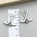 Silver golf club and ball charms with hanging rings and measurement scale - Crossed Golf Clubs and Ball