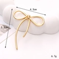 Polished gold bow alloy accessory for DIY phone cases and jewelry making, 4.3cm wide - Gold Ribbon Bow
