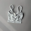 White high-impact sports bra featuring twist back design and thin dual straps - White